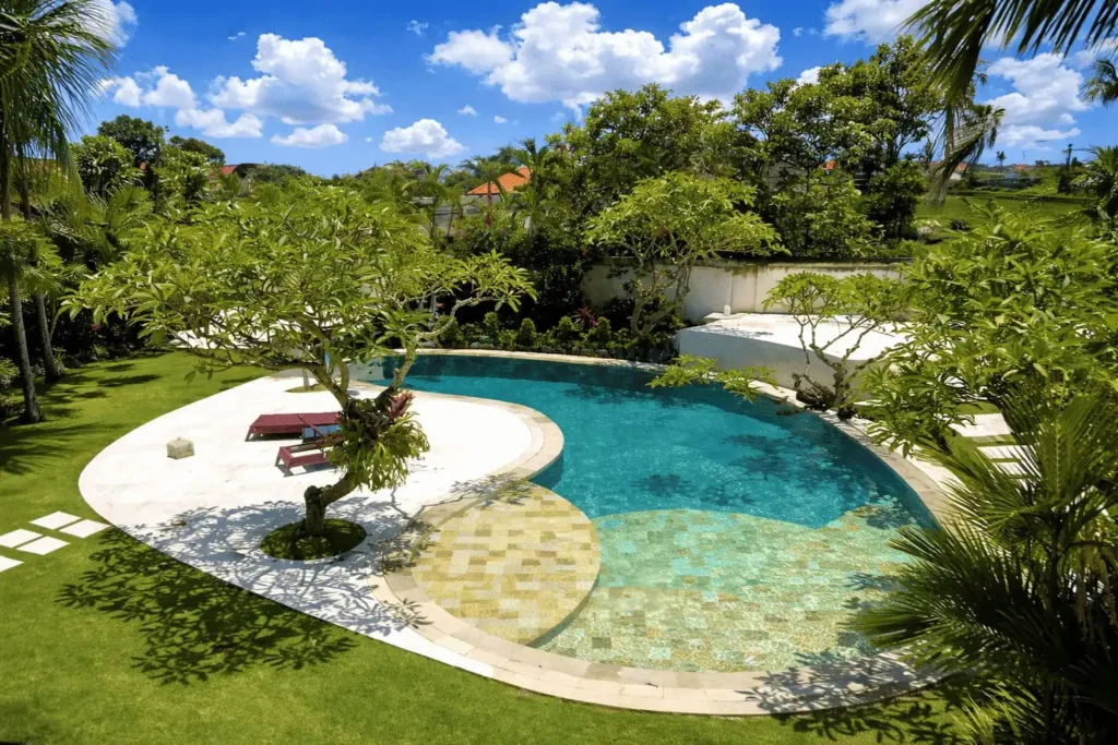 tropical backyard with a stunning pool